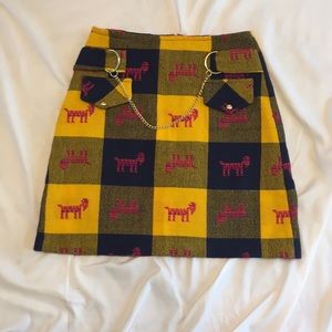Plaid goat skirt with chain accent